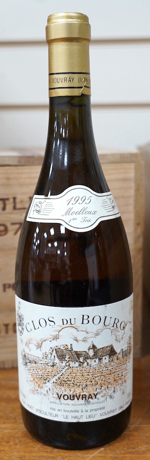 Two sealed cases of twelve bottles (twenty-four bottles) of 1995 Vouvray Clos Du Bourg, in cardboard boxes, purchased en primeur from The Wine Society. Condition - good.